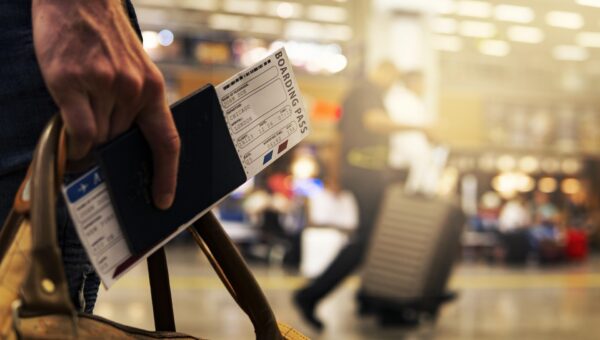Passport and Flight Ticket indicating international Travel
